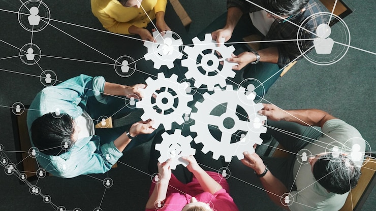 top-view-smart-business-people-joining-gathering-wooden-gear-symposium_31965-496822
